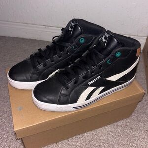 Reebok Black and White Mid-Top Sneakers with Teal Eyelets